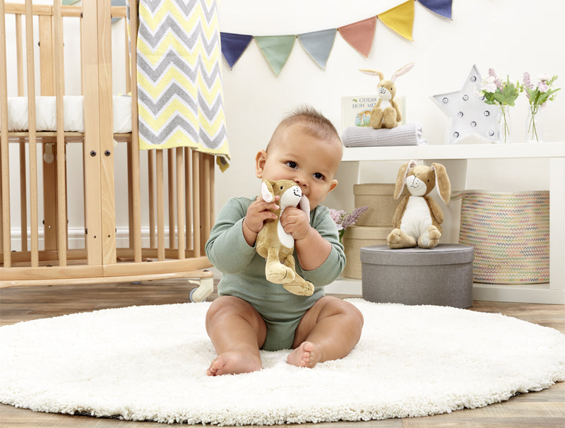 This cute Guess How Much I Love You Hare Rattle is made from baby soft plush and has a gentle chime. Sold by Say It Baby Gifts