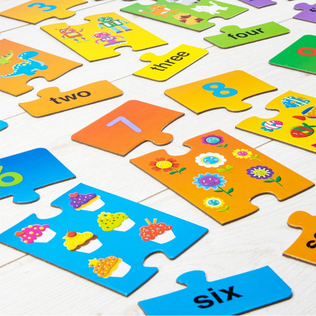 Galt Number Puzzles. Colorful number puzzle pieces on a white surface