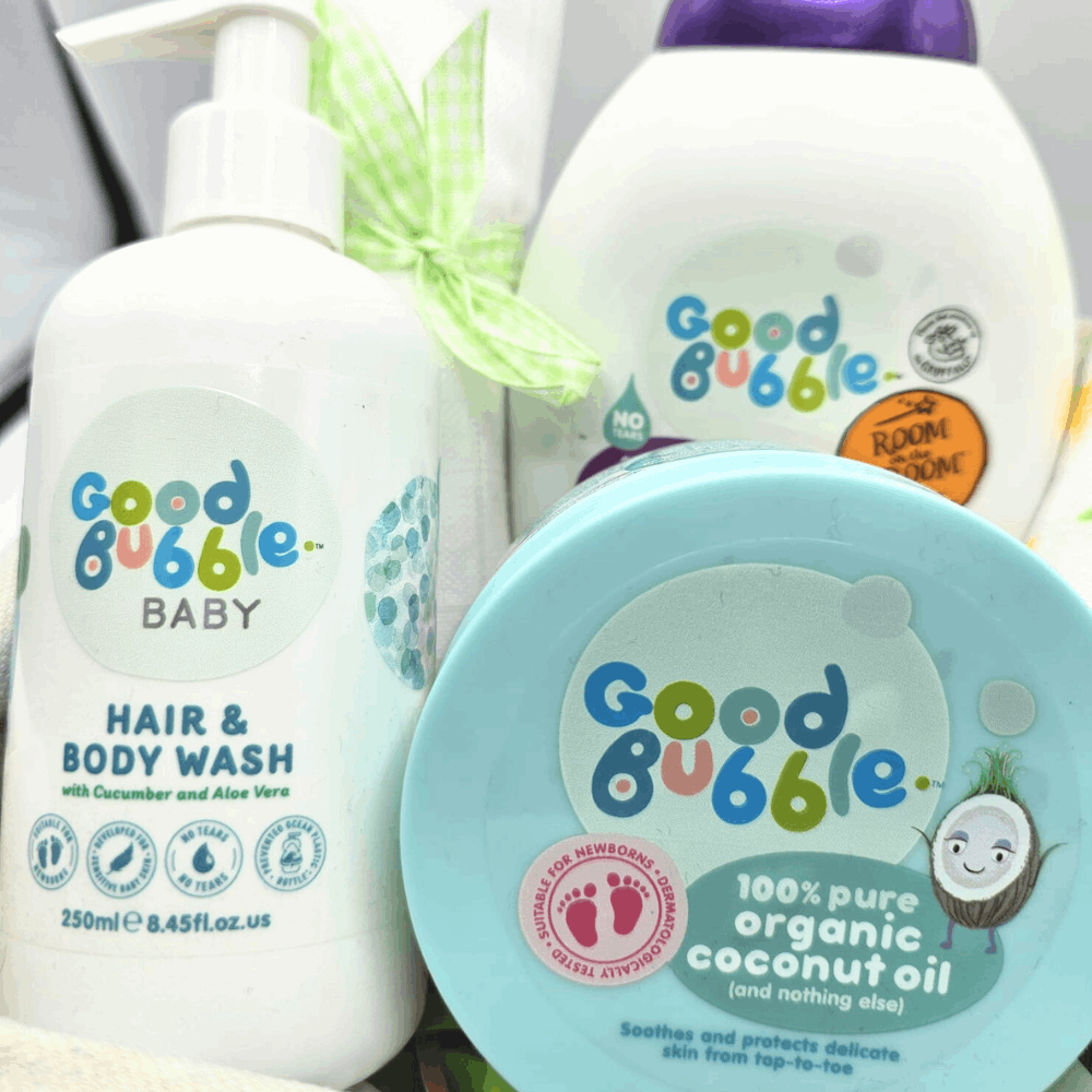 Good Bubble Baby Bath Time Gift Basket. This simple but gorgeous baby basket contains a special range of natural baby skincare from Good Bubble, alongside soft baby muslin squares.