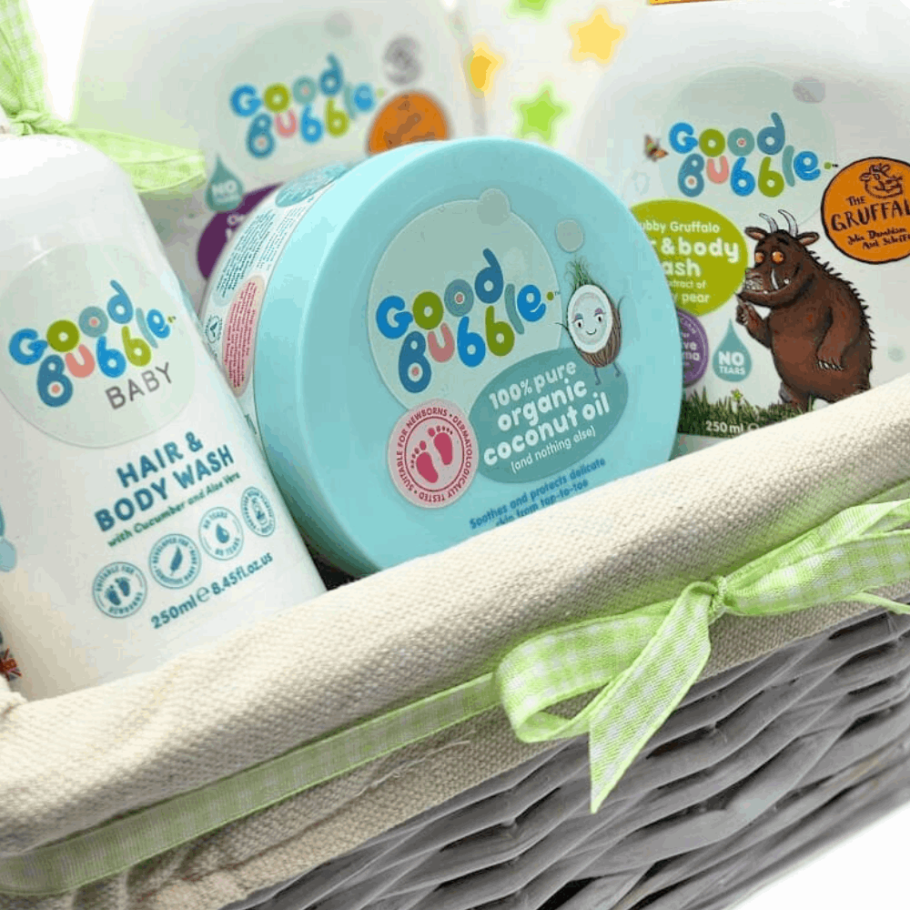 Good Bubble Baby Bath Time Gift Basket. This simple but gorgeous baby basket contains a special range of natural baby skincare from Good Bubble, alongside soft baby muslin squares.