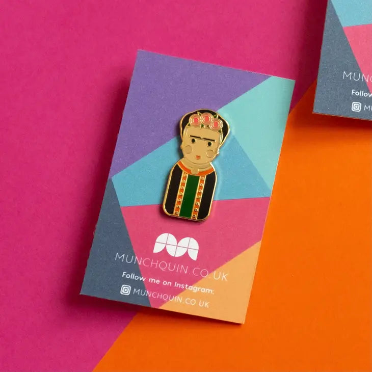 Munchquin Frida Kahlo Hard Enamel Pin- a quirky and fun enamel pin badge with a quirky Frida Kahlo design.