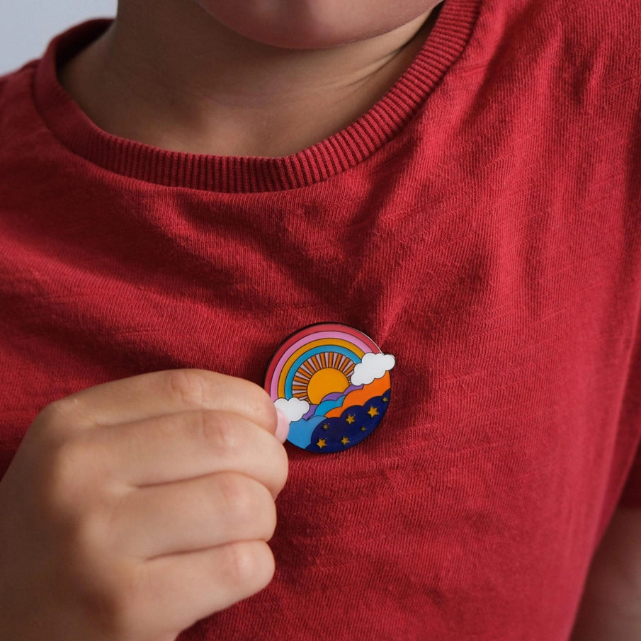 Munchquin Retro Rainbow Hard Enamel Pin - a quirky and fun enamel pin badge featuring a colourful retro rainbow and sunset design.
