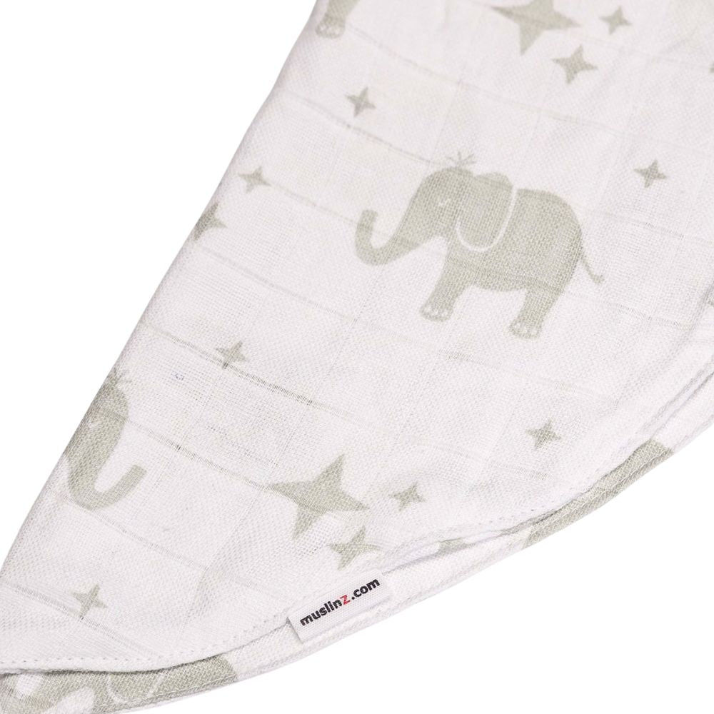 Muslinz Mini Muzi - Elephant White muslin blanket with gray elephants and stars, featuring a visible brand logo muslinz.