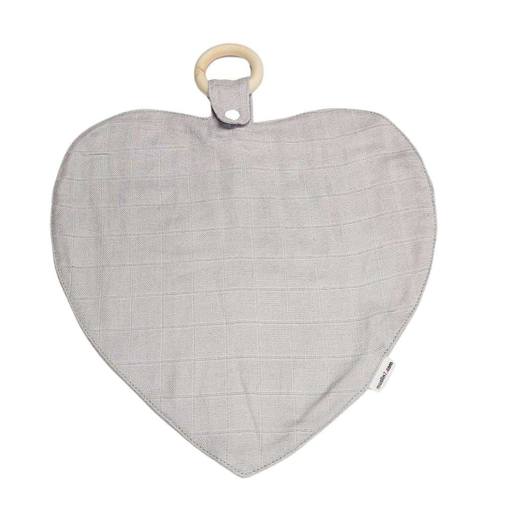 Muslinz Mini Muzi - Sensory - Heart-shaped gray fabric baby toy with a wooden ring on a white background