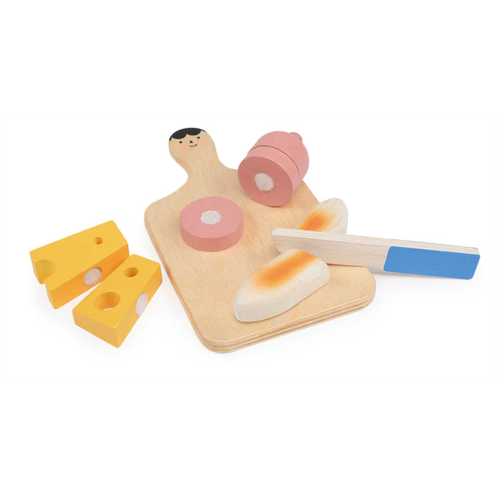 Mentari Smiley Charcuterie Chopping Board. Wooden toy pizza set with slices on a white background