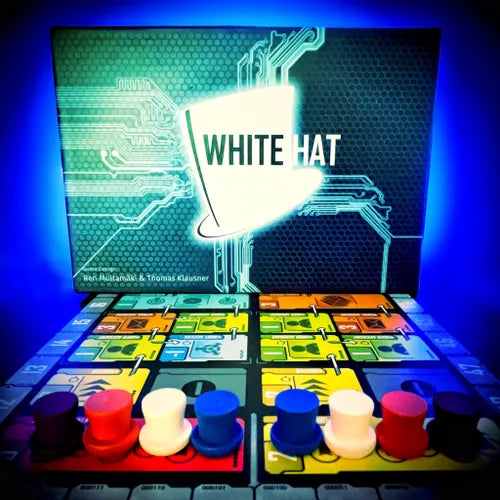Board game set with colorful pieces and a 'White Hat' branded box. White Hat Board Game