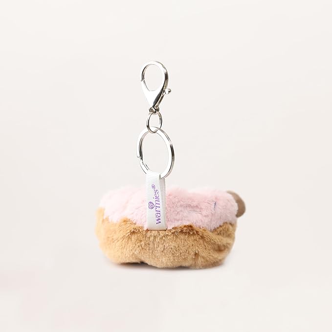 Warmies Donut Bag Charm - Plush doughnut keychain with a smiling face on a cream background - back view
