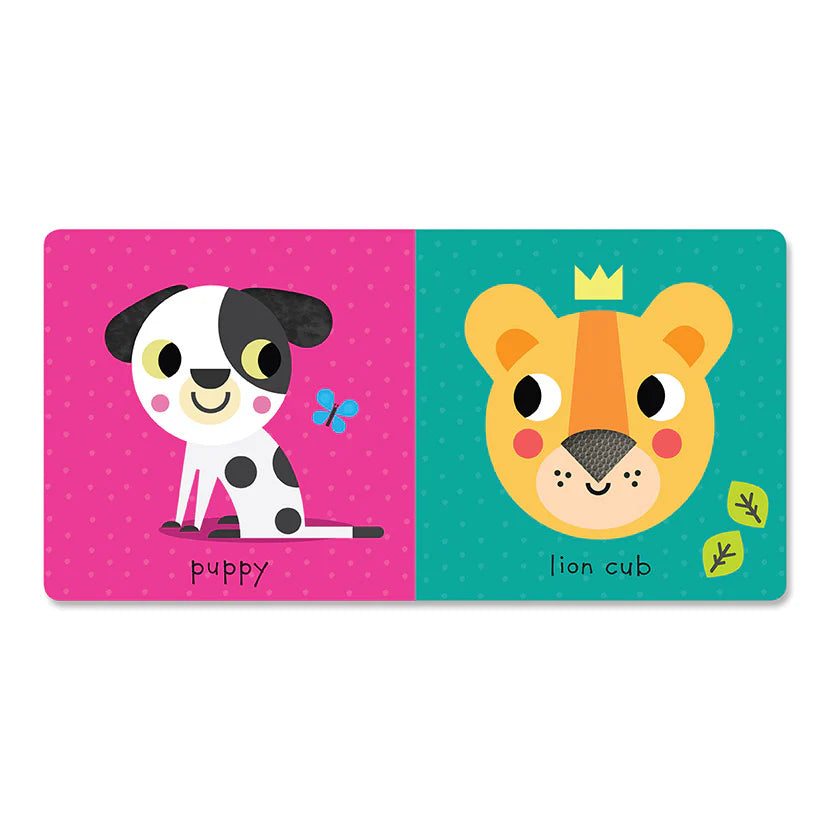 Children's book with illustrations of a puppy and a lion cub on pink and green pages. Baby Animals Touch & Feel Book
