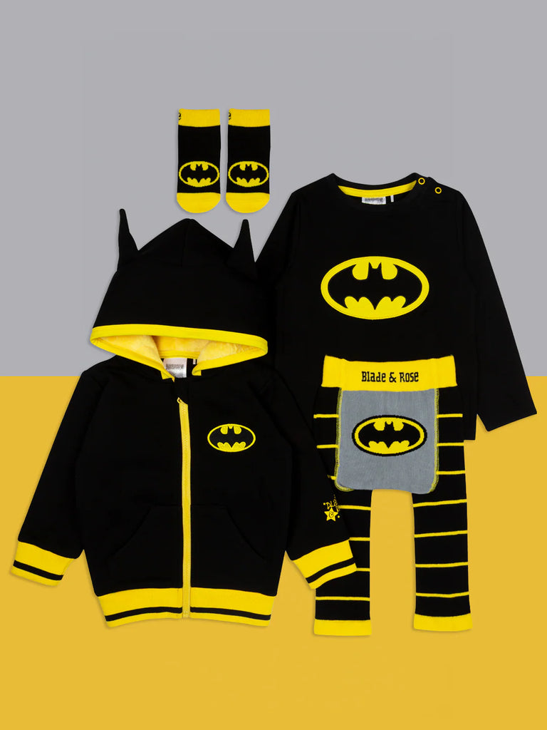 Blade & Rose Batman Hoodie. Batman-themed children's outfit with hoodie, pants, and socks on a gray and yellow gradient background.