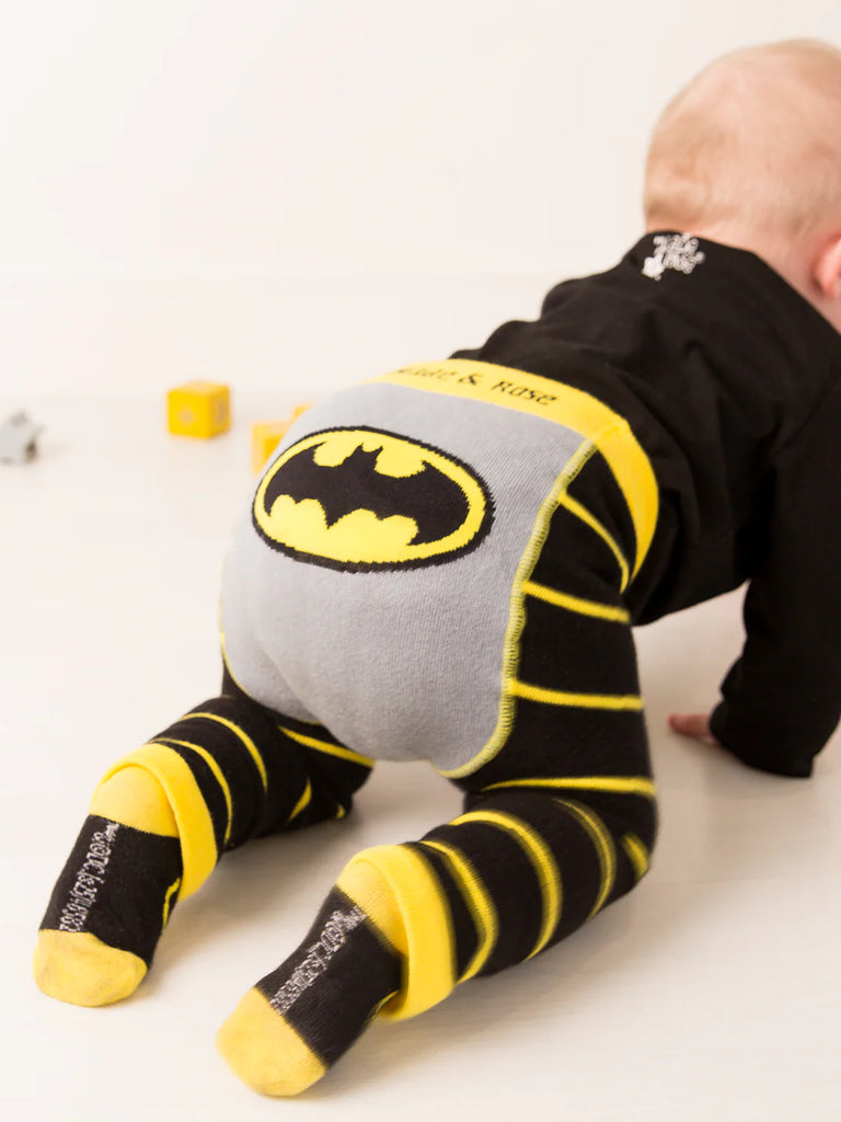 Blade & Rose Batman Leggings. Baby wearing Batman-themed socks on a light background
