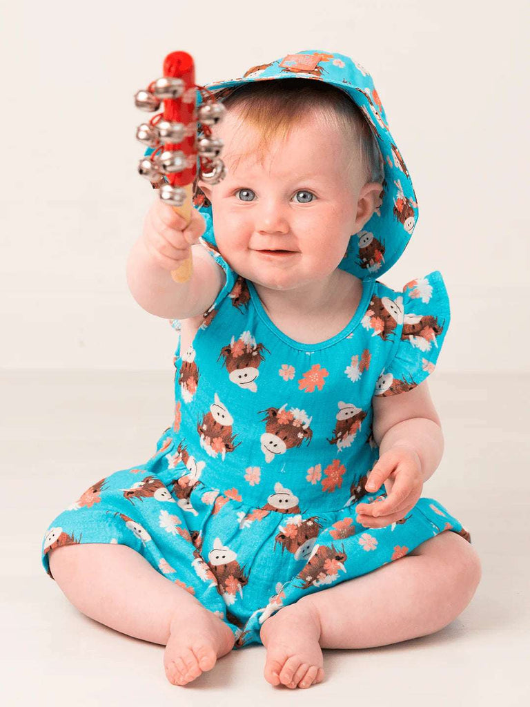 A gorgeous sunproof summer hat with an adorable Bonnie the Highland Cow design. Matching dress available
