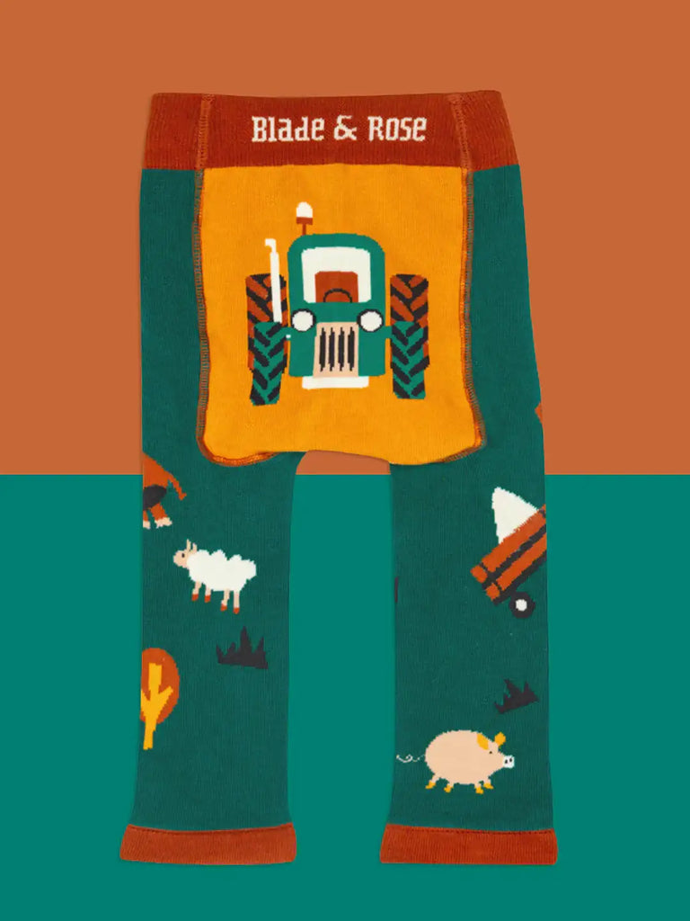 Blade & Rose Rustic Farmyard Leggings. Children's leggings with tractor design and 'Blade & Rose' branding on an orange and green background.