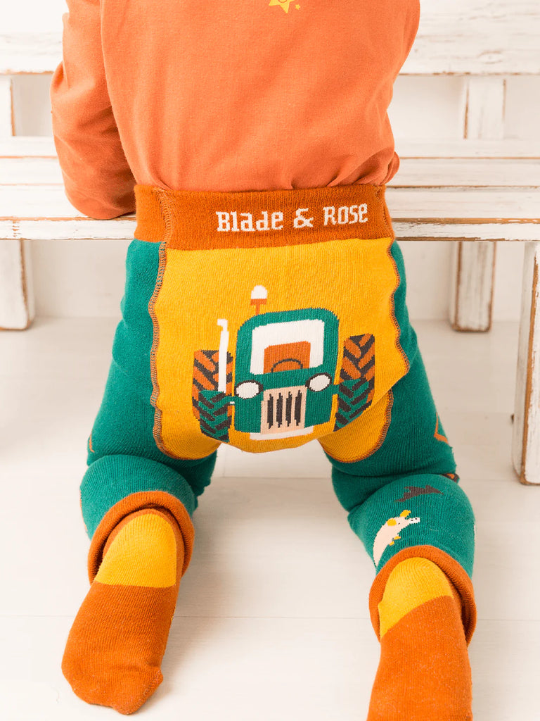 Blade & Rose Rustic Farmyard Leggings. Children's colorful pants with a tractor design and 'Blade & Rose' branding on a white background.