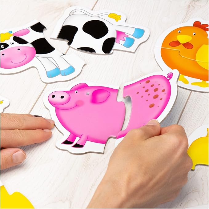 Galt Baby Puzzle - Farm. Children's farm animal puzzles with a pink pig, cow, and chicken on a white surface.