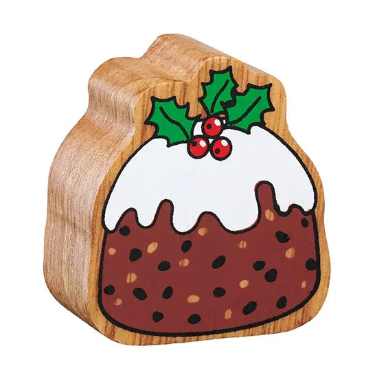 Wooden Christmas pudding toy with holly leaves and berries on a white background