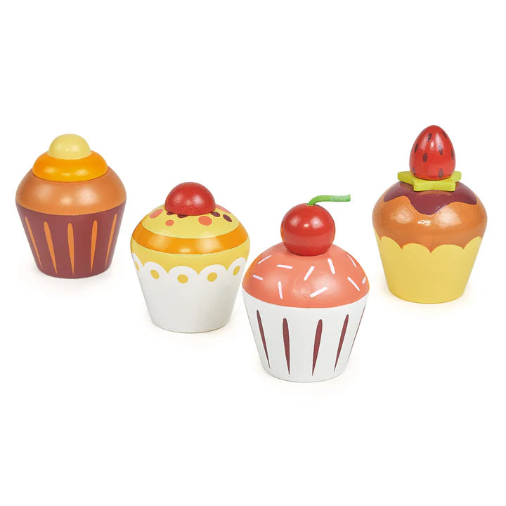 Mentari Tea Time Cupcake Set. Set of four colorful toy cupcakes with different toppings on a white background