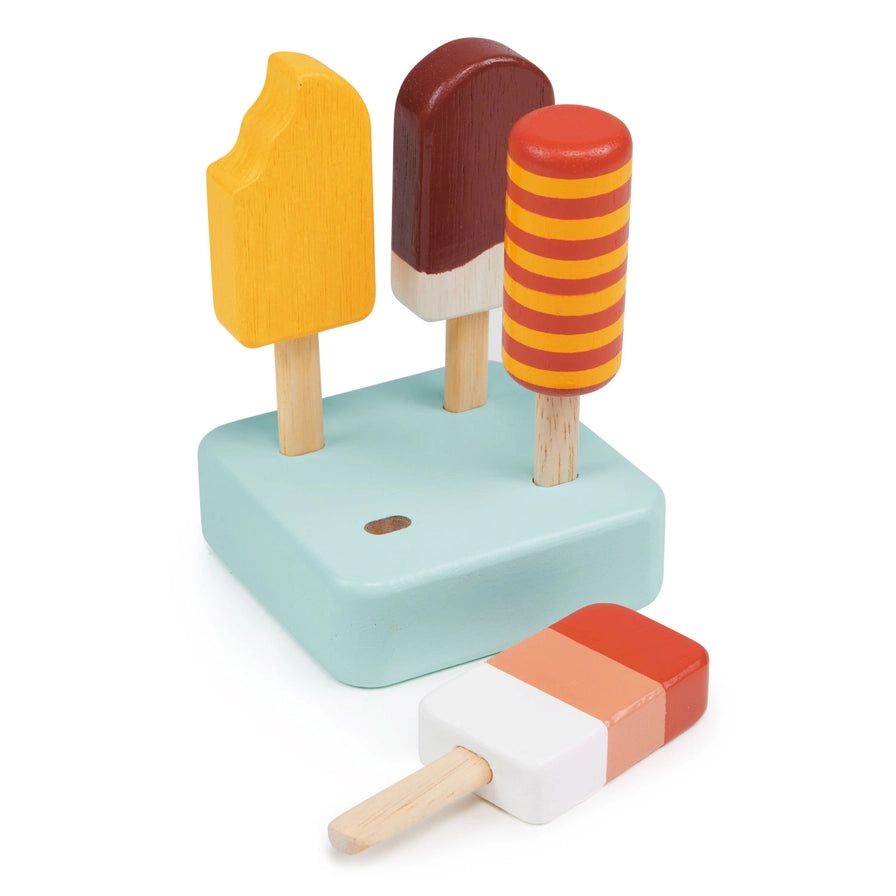 Mentari Sunny Ice Lollies. Set of colorful wooden ice cream popsicles on a white background