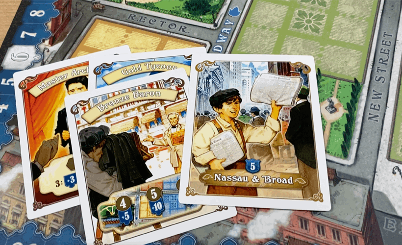 New York 1901. Board game cards with character illustrations and game pieces on a colorful board