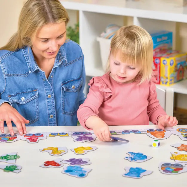 Orchard Toys Colour Match Express Game - child playing with an adult