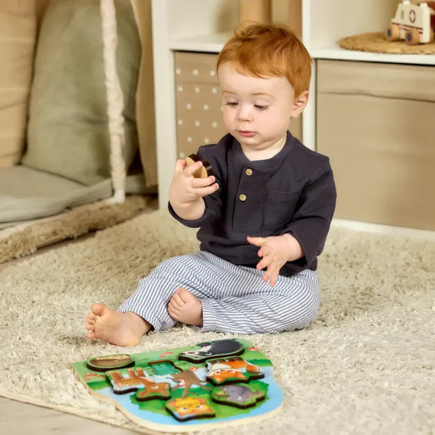Orchard Toys Woodland Chunky Wooden Puzzle - featuring wooden animals. Child playing