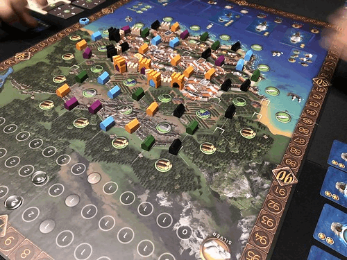 Ragusa Board game with colorful pieces on a detailed map