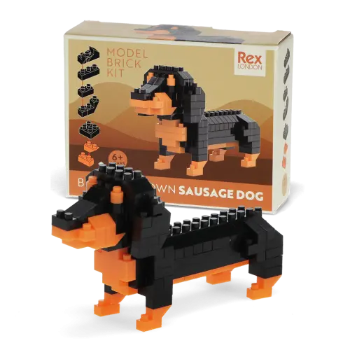 Build Your Own Mini Sausage Dog Brick Kit.. Model brick kit of a sausage dog with packaging featuring the brand 'Rex London'.