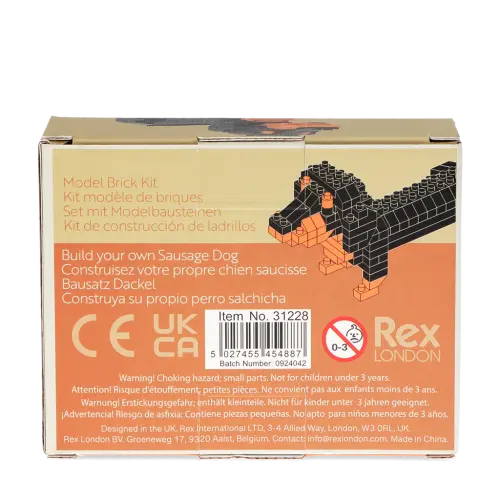 Build Your Own Mini Sausage Dog Brick Kit.. Model brick kit packaging for a sausage dog with branding and product details.