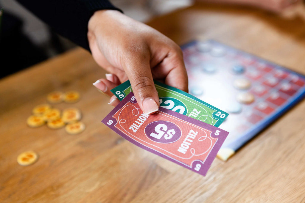 Zillionaires on Mars is a party auction game for family and adults that's quick to learn and easy to play. Big Potato, sold by Board Hoarders