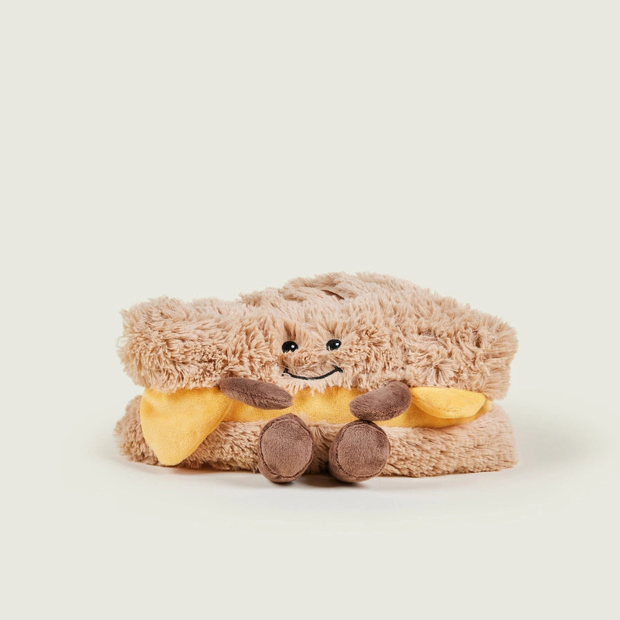 Warmies Grilled Cheese - Plush toy resembling a grilled cheese sandwich with a face on a light background