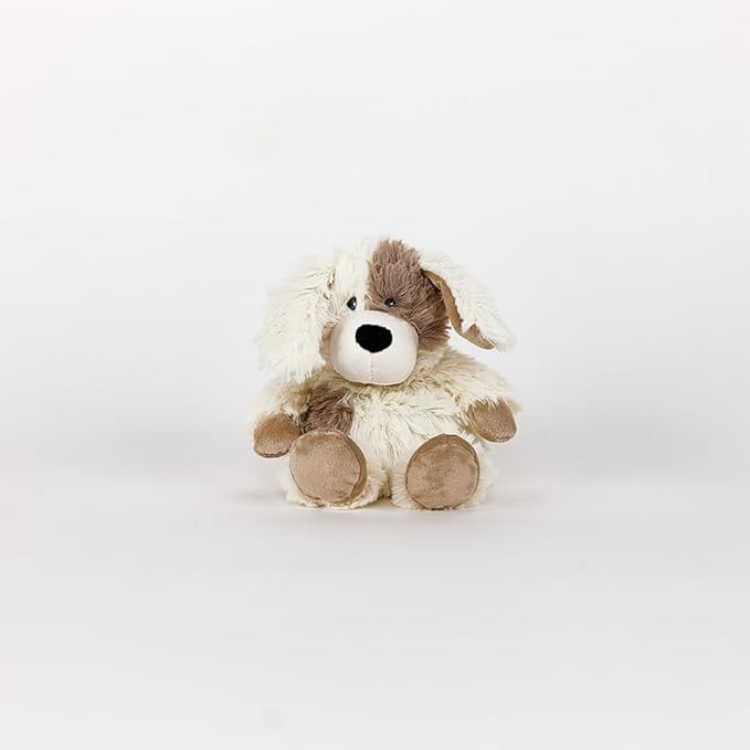 Warmies Mini Puppy. Plush dog toy with white and brown fur on a light gray background