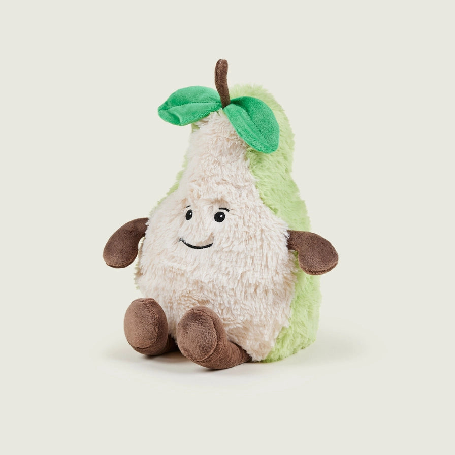Warmies Pear - Plush toy shaped like a pear with a smiling face on a beige background - side view