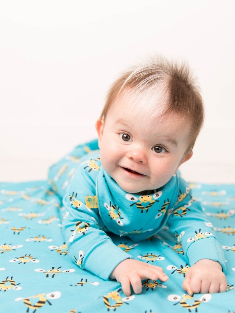 Blade & Rose Buzzy Bee Blanket - bold, bright and fun! This gorgeous blanket is made from soft cotton and features a blue and yellow buzzy bee design on one side and contrasting stripes on the reverse. Sold by Say It Baby Gifts