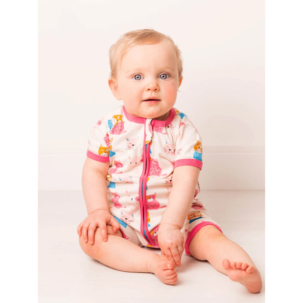 Blade & Rose Willow The Cat Romper - with a gorgeous all-over Willow the Cat print in cream and bright pink it's perfect for warmer weather.