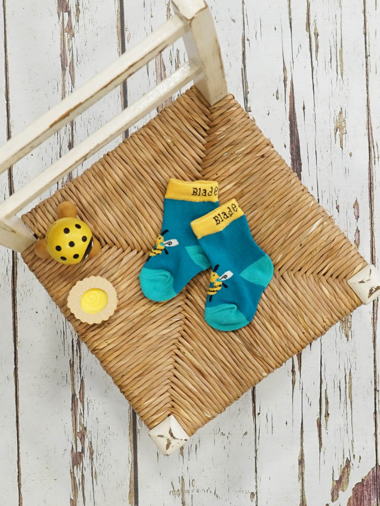 Blade & Rose Buzzy Bee Socks - bold, bright and fun! These gorgeous socks have a fluffy flying bee design. Say It Baby Gifts