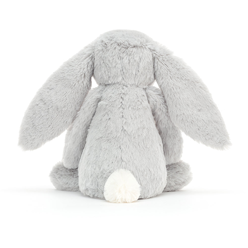 This super soft Jellycat Shimmer bunny has gorgeous soft silvery fur, long floppy sparkly ears and a cute white bobtail. She really is an ideal first soft toy and is sure to make bedtime more magical! Sold by Say It Baby Gifts