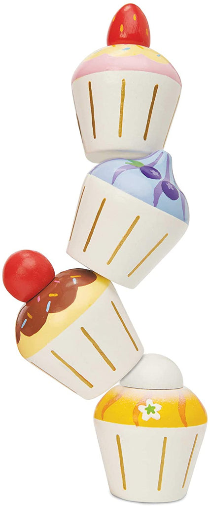 Le Toy Van Petit Four Cupcakes - This set includes 4 delicious cupcakes - all uniquely designed. Chocolate with sprinkles and a cherry on top, sweet blueberry, strawberry and a delicious fruity petit four dusted  in sweet icing - all presented in a sweet window gift box, just like the real thing - YUM! 