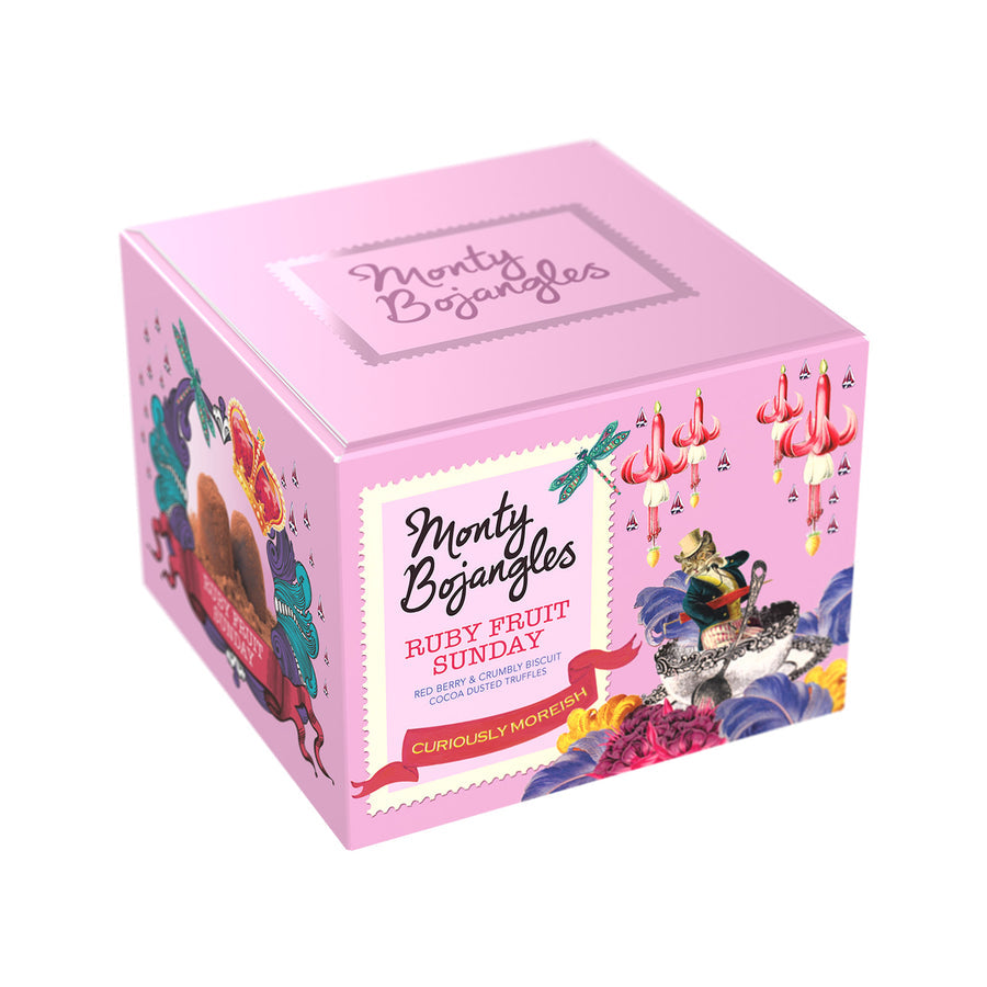 Monty Bojangles Ruby Fruit Sunday Cocoa Dusted Truffles. Deliciously decadent, these delightful truffles are whirled up with red berry and crumbly biscuit, finished with a generous dusting of exquisite bitter-sweet cocoa.