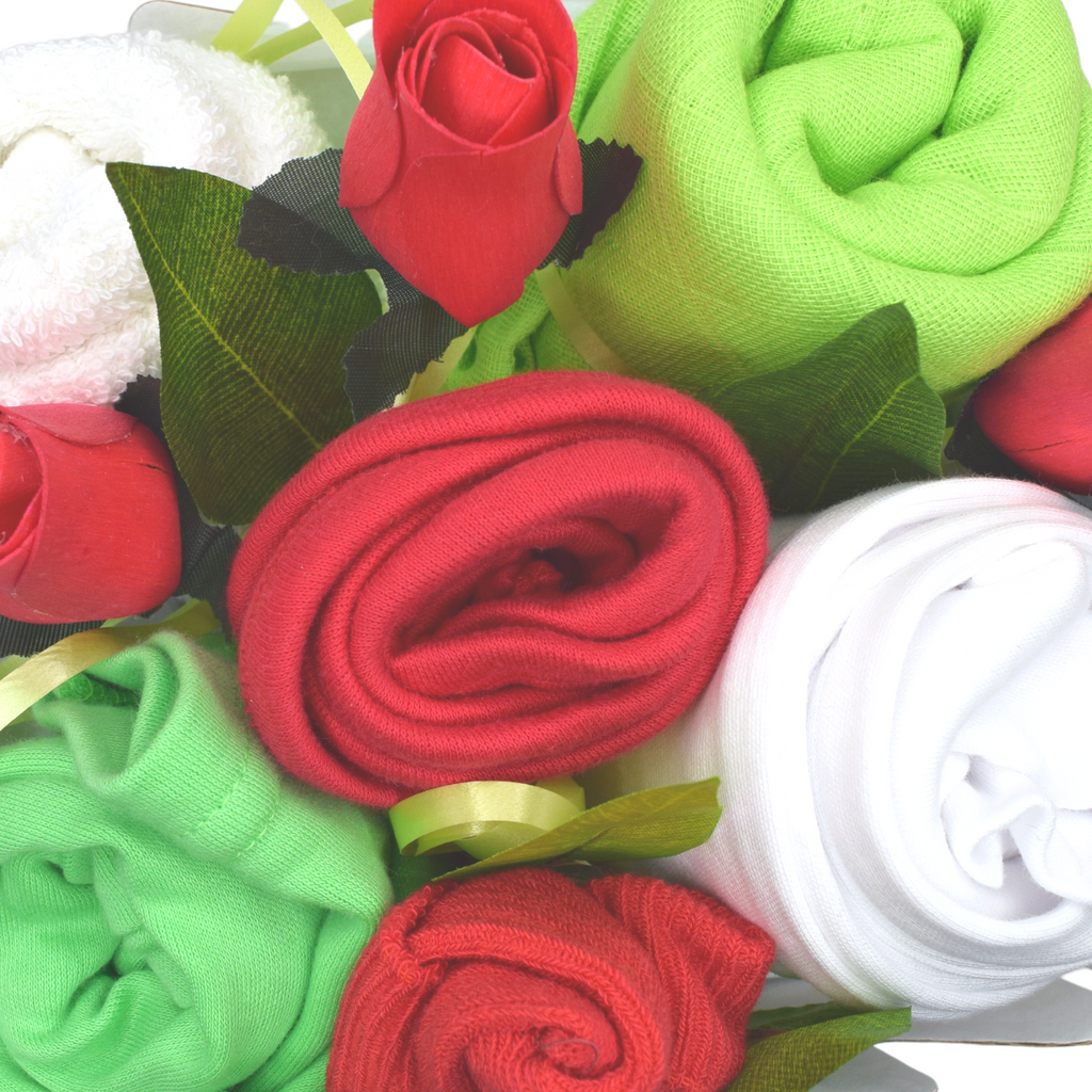 Seasonal Winter Baby Clothes Bouquet. Send new baby wishes with this adorable take on a traditional flower arrangement in cosy winter colours. Say It Baby Gifts Bouquet new baby gift