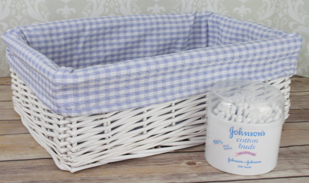 White Wicker Basket with Blue Gingham Lining - Medium. Dimensions : 35x24x12cm high. Sold by Say It Baby Gifts