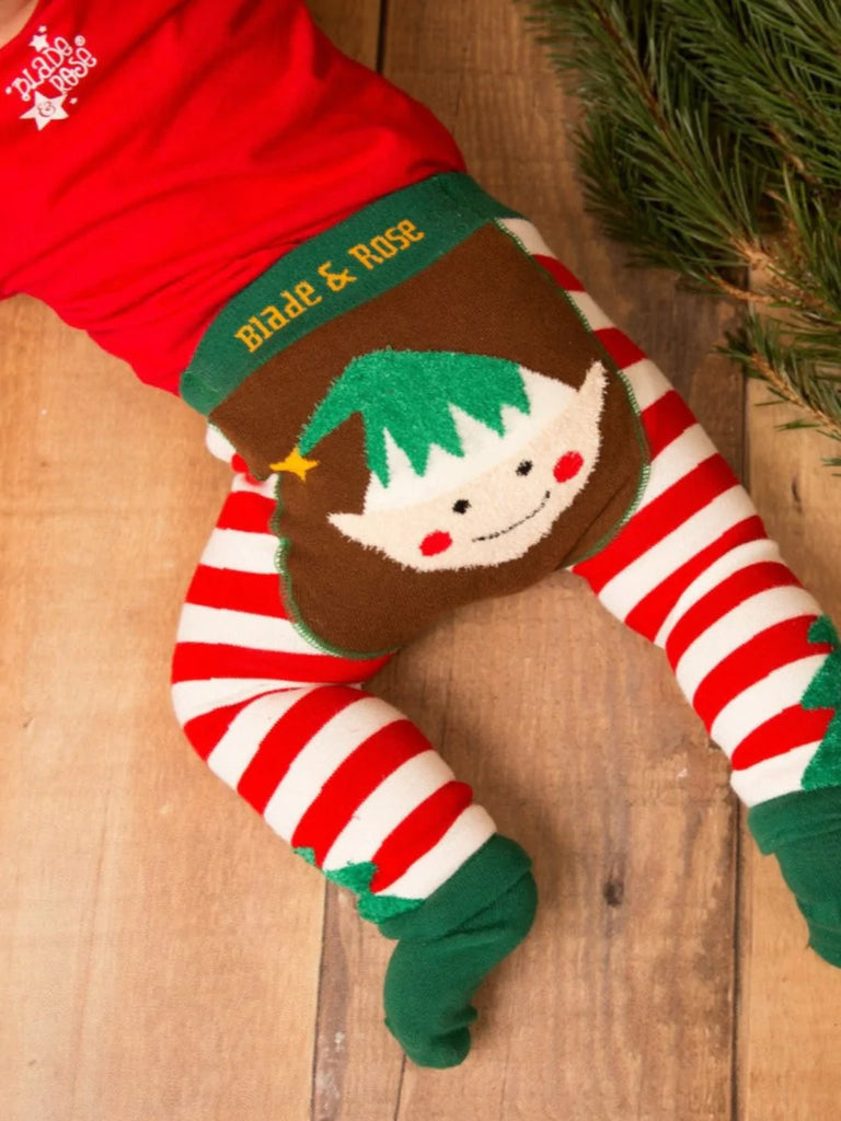 Blade & Rose Elf Leggings - bold, bright and fun! These fab leggings have red and cream stripes with fluffy knit Christmas trees on the hem and fluffy elf face on the bum! Sold by Say It Baby Gifts