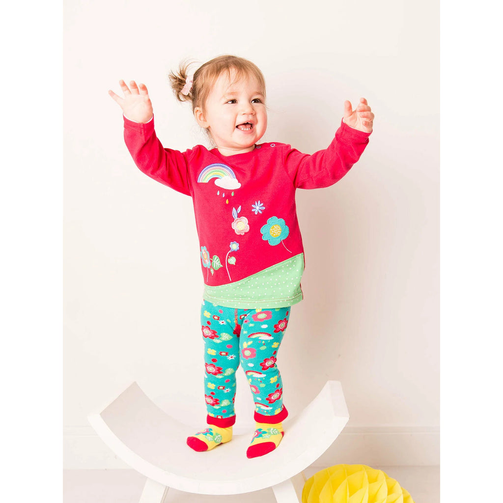 Blade & Rose Floral Garden Top - bold, bright and fun! This gorgeous magenta top has a lovely floral garden pattern with rainbow and cloud design.