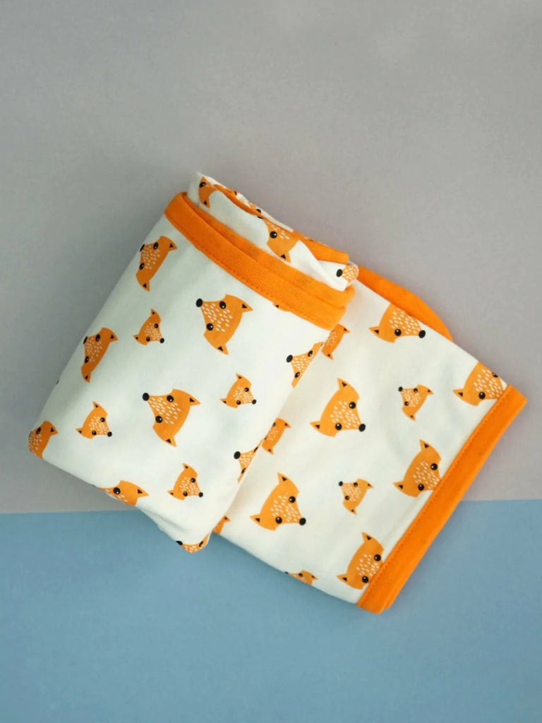 Blade & Rose Fox Blanket - bold, bright and fun! This gorgeous blanket is made from soft cotton and features a sweet orange fox design on one side and contrasting black and cream stripes on the reverse.. Sold by Say It Baby Gifts