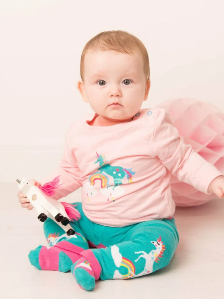 Blade & Rose Magical Sparkly Unicorn Top- bold, bright and fun! This gorgeous pastel pink top features a magical, mystical, flying unicorn, and most importantly, it sparkles! Sold by Say It Baby Gifts