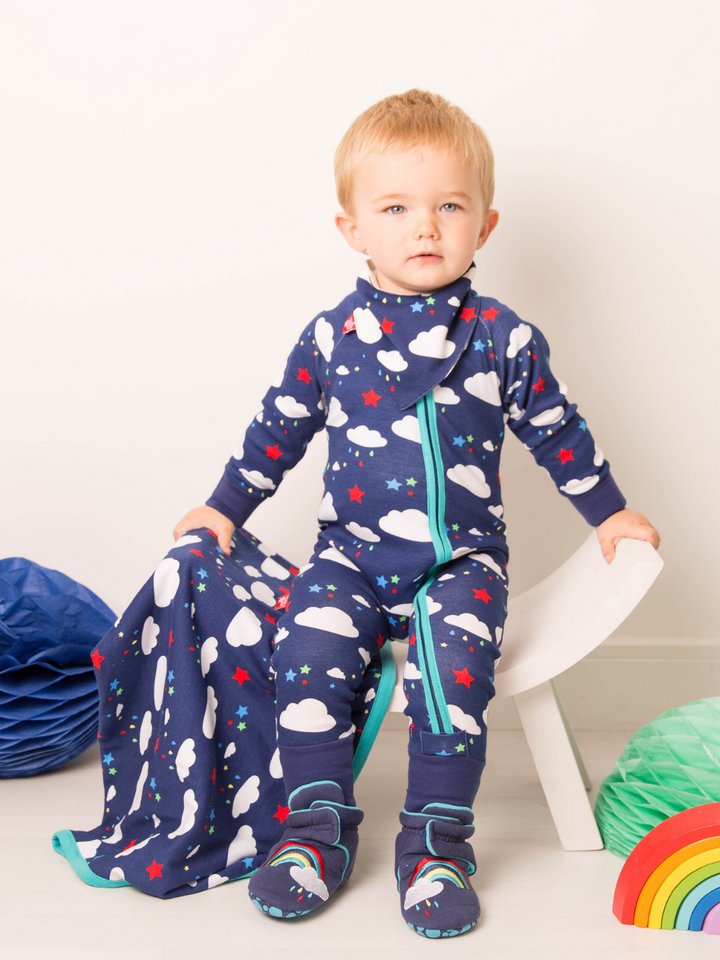 Blade & Rose Weather Zip Up Romper - bold, bright and fun! This fab romper is navy blue with contrasting teal zip and the cutest weather design of fluffy white clouds and multi-coloured stars and raindrops.