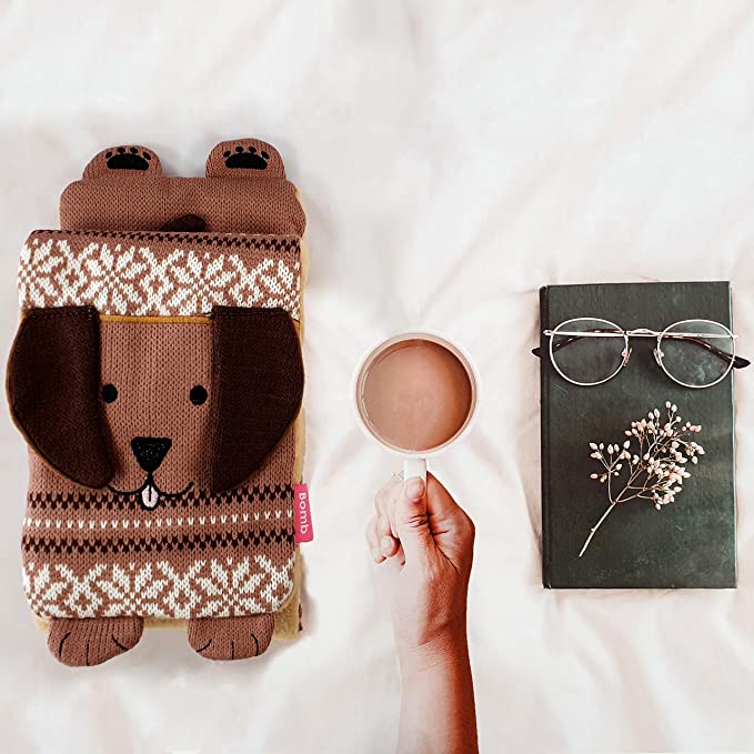 Hug and heat up with this fab Duke The Dog Neck Warmer. This fab neck warmer has a cosy pattern and features a happy little dog with velevety soft ears, tail and the cute paws! Sold by Say It Baby Gifts