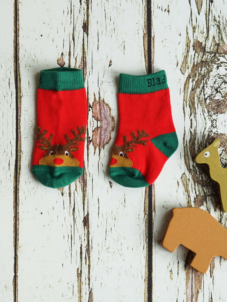 Blade & Rose Festive Reindeer Socks - bold, bright and fun! These festive socks in red feature a sweet reindeer with fluffy knit detailing on the antlers. Sold by Say It Baby Gifts