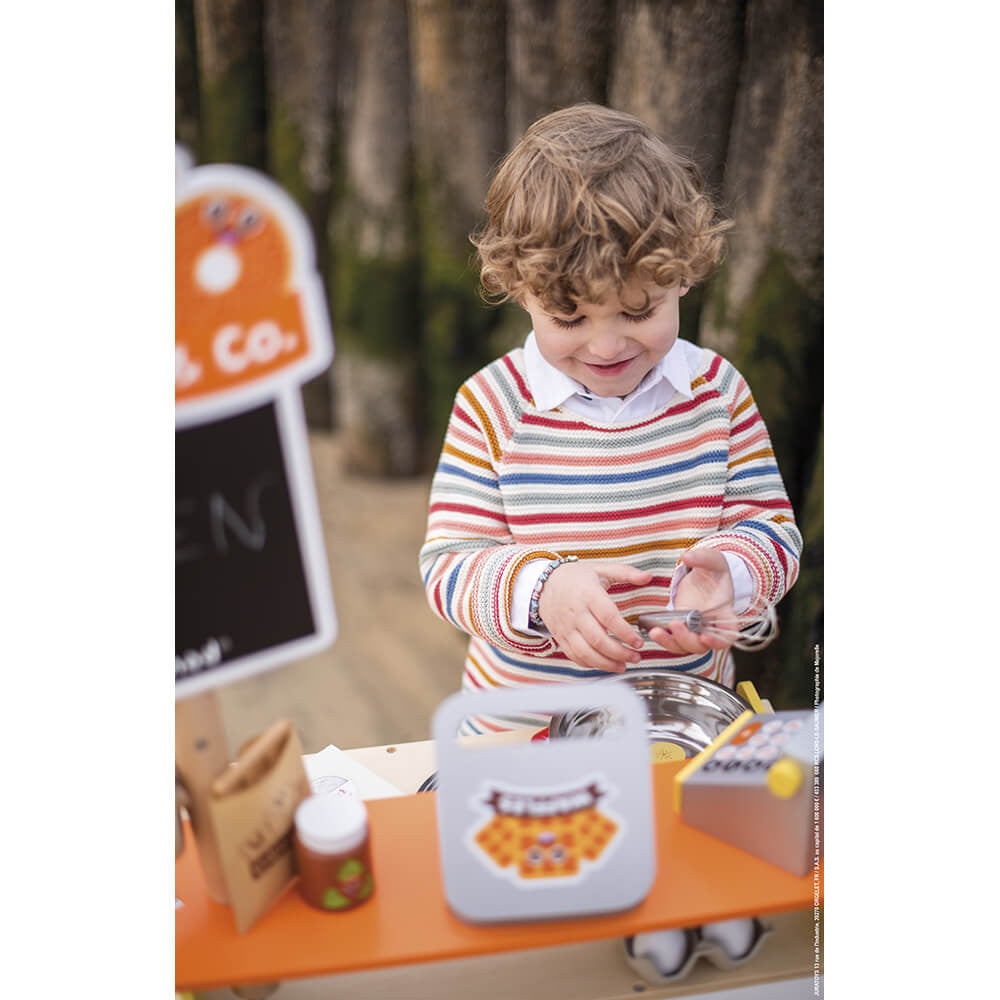 Janod Crepes & Co Waffle House. This fab pop-up food stand has everything included that kids will need to run a fantastic food stall including utensils, bowl, waffle press, eggs, food, toppings, cash register, money and more! It even has a little wooden chalk board and chalk to write the daily"Specials" on! A fantastic wooden gift that will encourage and develop free play and imagination!