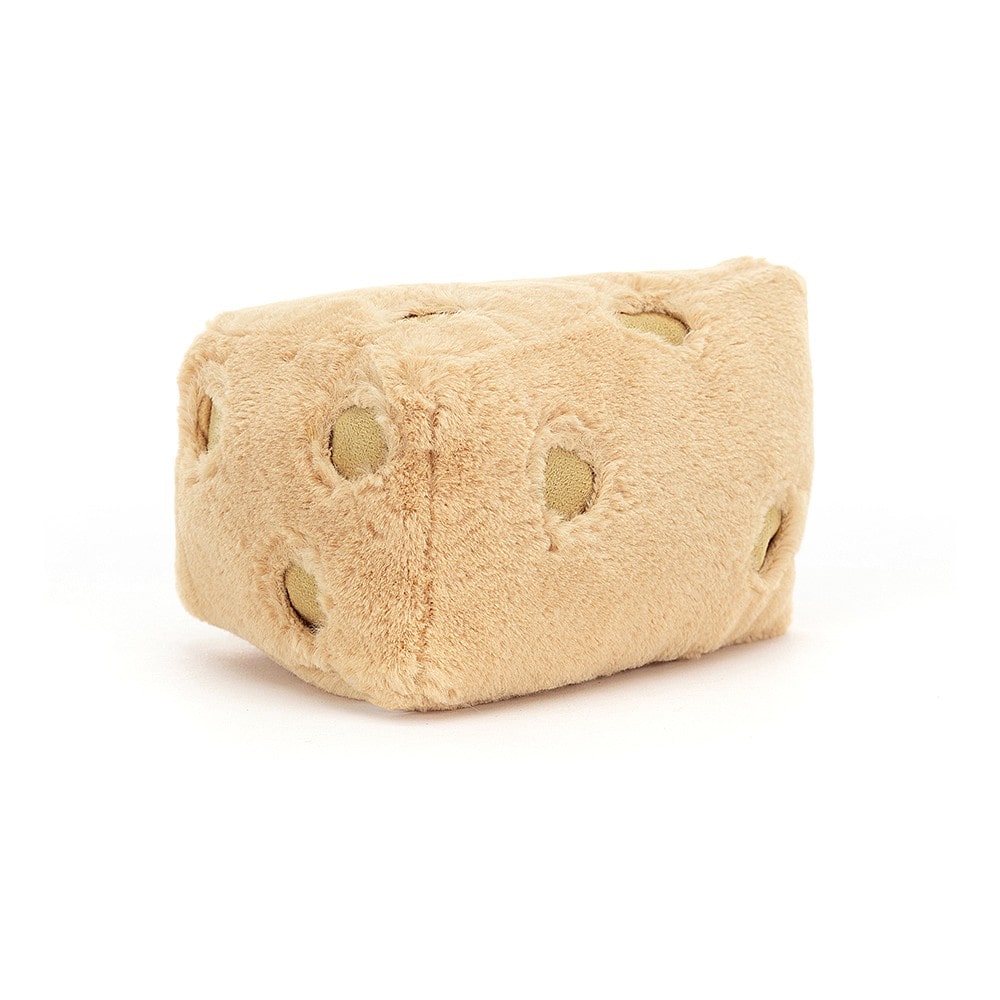 This scrumptious little Swiss Cheese is beige with suedey patches, cordy feet and the biggest cheesiest smile.