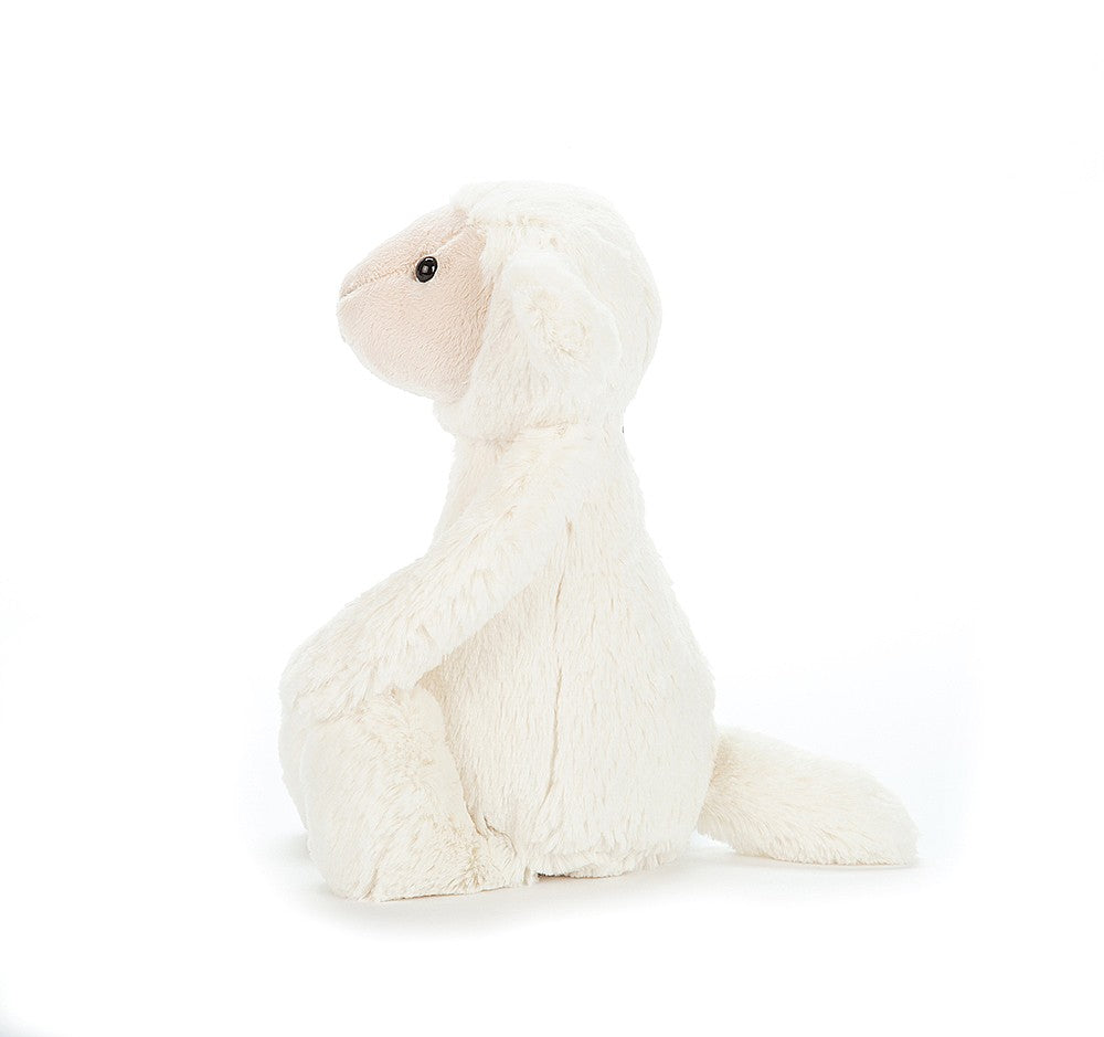 Jellycat Bashful Lamb Medium - This super soft Jellycat cream lamb has gorgeous soft buttercream fur, flopsy ears and a cute white tail.  Sold by Say It Baby Gifts. BAS3LUS