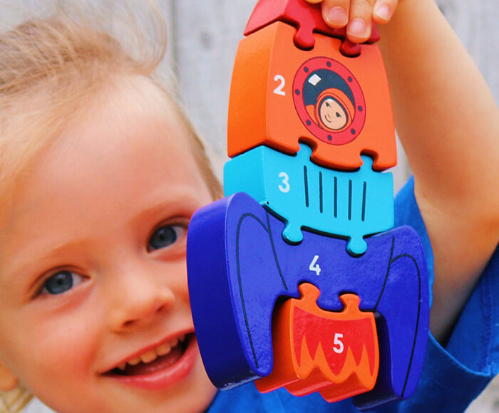 Lanka Kade 5 Piece Rocket Jigsaw - a fantastic chunky five piece jigsaw. Little ones can learn to count as they slot puzzle pieces together to create a fun space rocket - blast off! Sold by Say It Baby Gifts